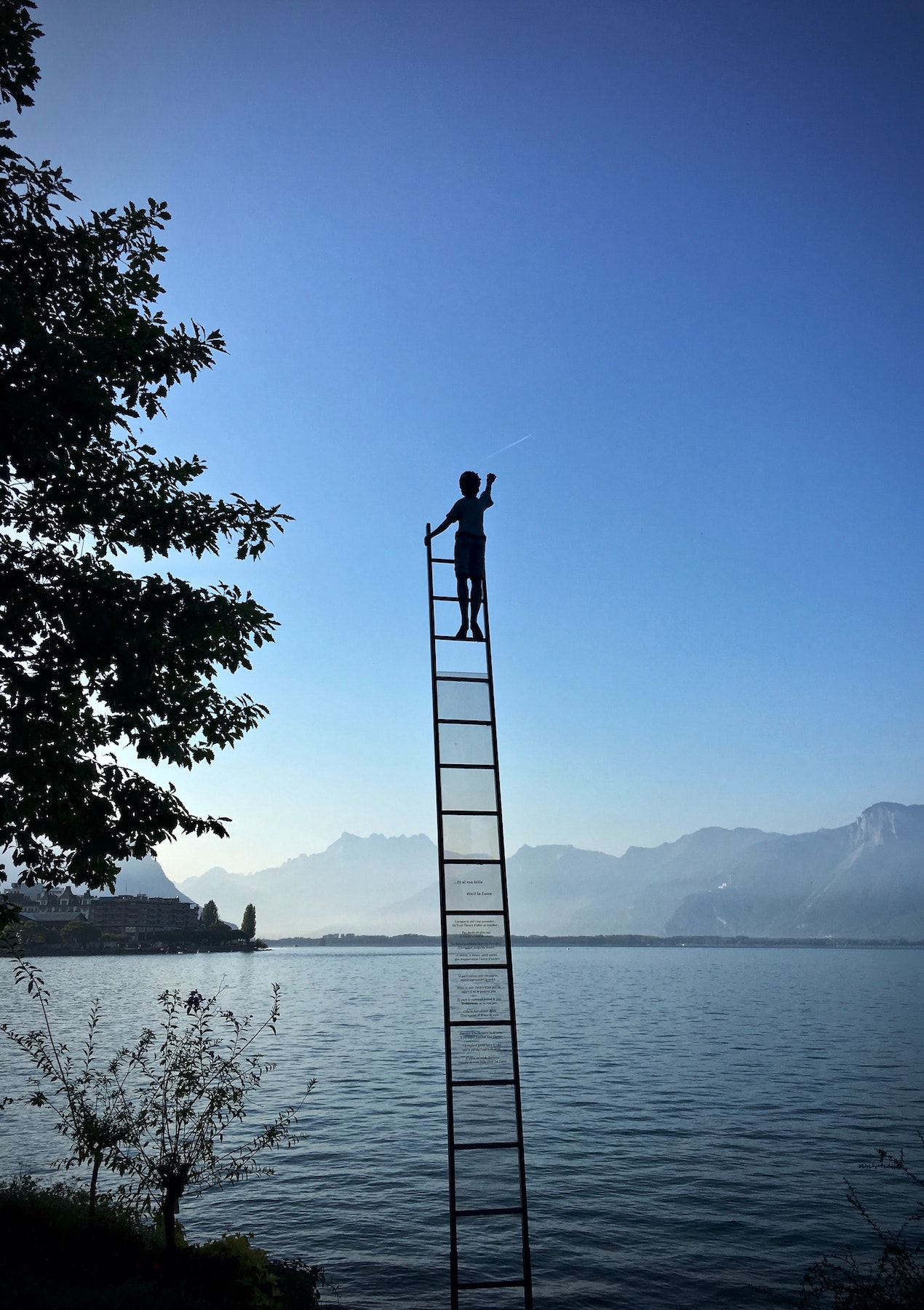 On top of a ladder in mid air